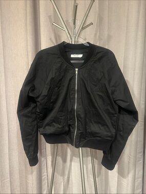 Mod Ref Black Ribbed Collar Bomber with embroidery details. 100 percent cotton.